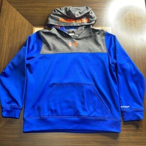 Under Armour boys long sleeved hooded sweatshirt blue size large.